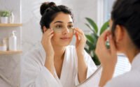 A-person-applying-a-cold-compress-or-eye-gel