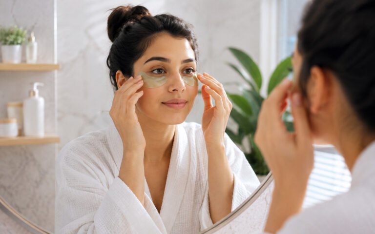 A-person-applying-a-cold-compress-or-eye-gel