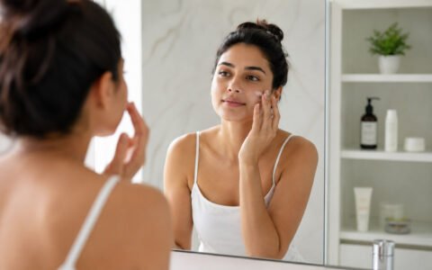 A-person-applying-a-skincare-product